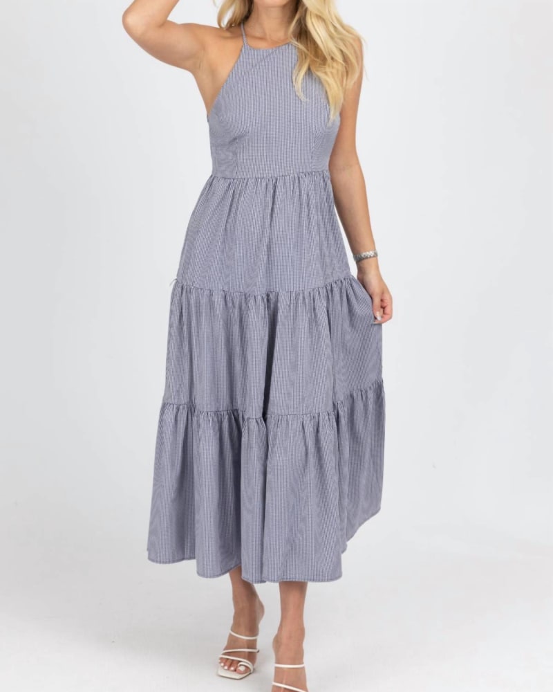Front of a model wearing a size L Gingham Tiered Open Back Maxi Dress In Navy in Navy by Fore. | dia_product_style_image_id:347782